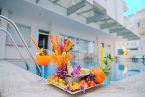 Seasonal outdoor pool, open 9 AM to 7:00 PM, free cabanas