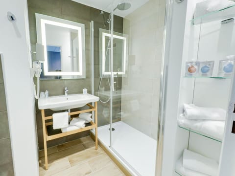 Shower, rainfall showerhead, eco-friendly toiletries, hair dryer