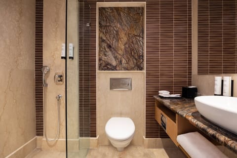 Suite, 1 King Bed | Bathroom | Shower, rainfall showerhead, designer toiletries, hair dryer