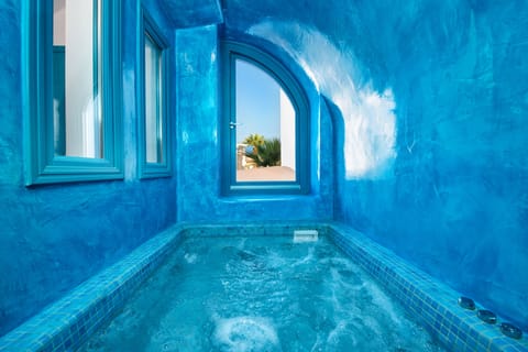 Suite, 2 Bedrooms, Hot Tub (Cave) | Private spa tub