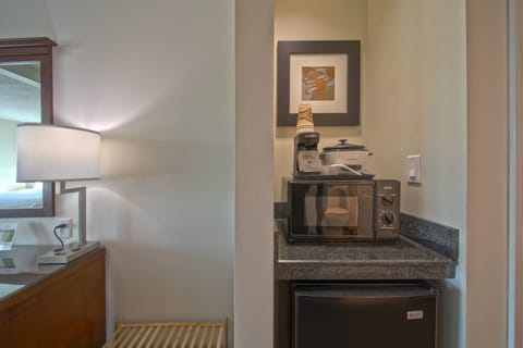 Desk, laptop workspace, blackout drapes, iron/ironing board