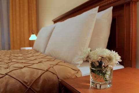 Premium bedding, down comforters, pillowtop beds, desk