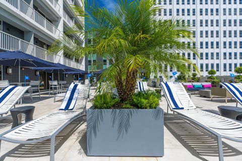 Outdoor pool, open 9:00 AM to 9:00 PM, free cabanas