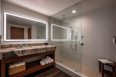 Suite, 1 King Bed | Bathroom | Combined shower/tub, eco-friendly toiletries, hair dryer, towels