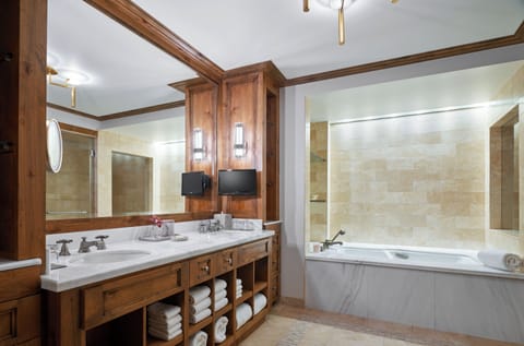 Designer toiletries, hair dryer, bathrobes, slippers