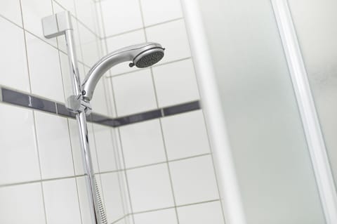 Bathtub, hair dryer, towels