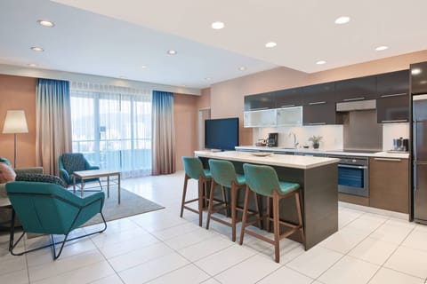 Suite, 1 Bedroom | Private kitchen | Full-size fridge, microwave, stovetop, dishwasher