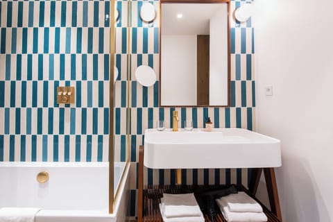 Eco-friendly toiletries, hair dryer, towels