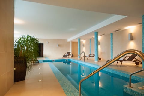 Indoor pool, open 9 AM to 9 PM, sun loungers