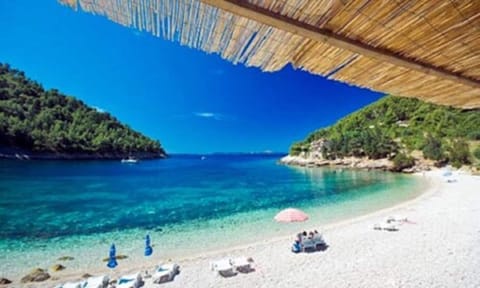Beach shuttle, sun loungers, beach umbrellas, beach massages