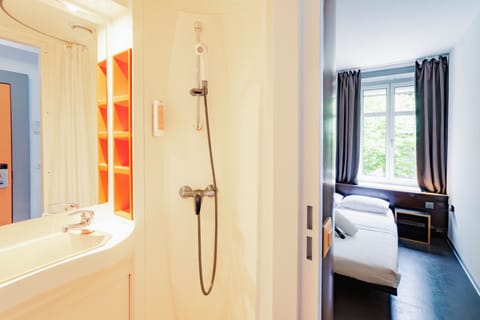 Economy Double Room, 1 Double Bed | Bathroom | Shower, free toiletries, towels