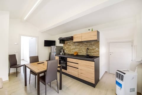 Fridge, oven, stovetop, espresso maker