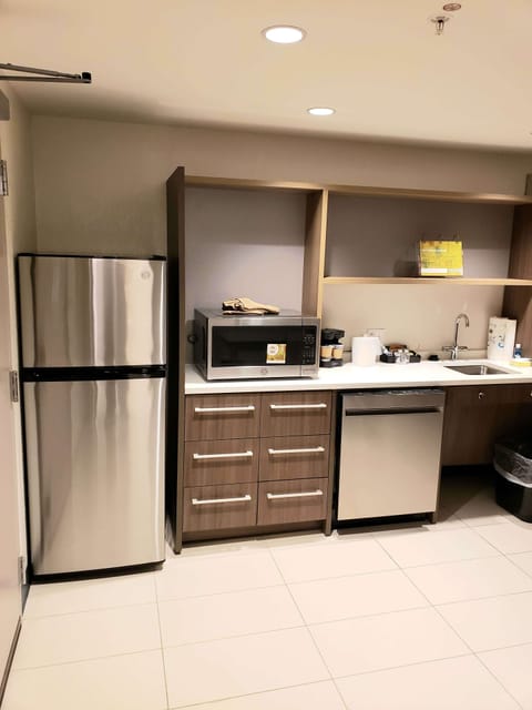 Suite, 1 Queen Bed, Accessible, Bathtub | Private kitchen | Full-size fridge, microwave, dishwasher, cookware/dishes/utensils