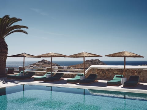 Seasonal outdoor pool, pool umbrellas, sun loungers