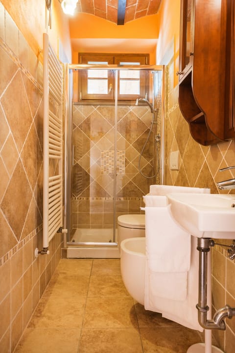 Apartment, 1 Bedroom | Bathroom | Shower, rainfall showerhead, hair dryer, bidet