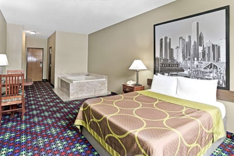 Suite, 1 Queen Bed, Non Smoking, Jetted Tub | Memory foam beds, blackout drapes, iron/ironing board, rollaway beds