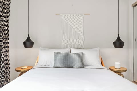 Premium bedding, down comforters, pillowtop beds, in-room safe