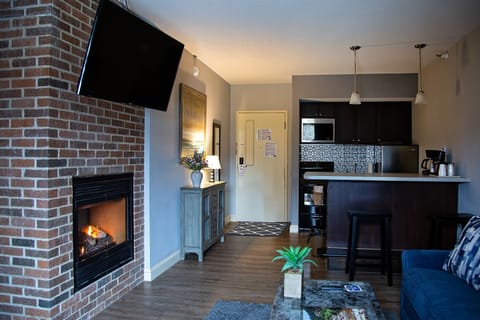 Exclusive Suite, Multiple Beds, Fireplace | Premium bedding, blackout drapes, iron/ironing board, rollaway beds