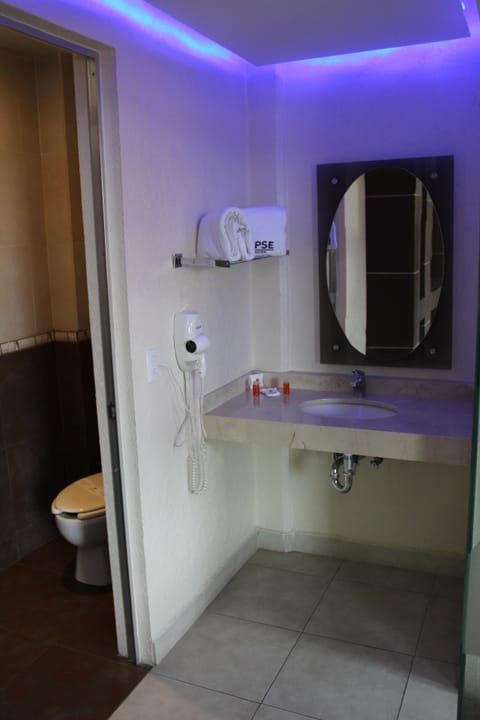 Suite, 1 King Bed, Non Smoking | Bathroom | Designer toiletries, towels, soap, shampoo