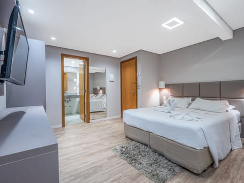Superior Triple Room | Minibar, blackout drapes, soundproofing, iron/ironing board