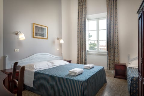 Desk, blackout drapes, soundproofing, iron/ironing board