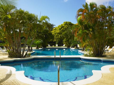 Outdoor pool, pool umbrellas, sun loungers