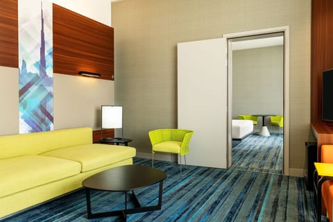 Savvy Suite King (Living Room + Two Bathrooms + Shuttle to Metro & Al Maktoum International Airport) | Living area | Smart TV