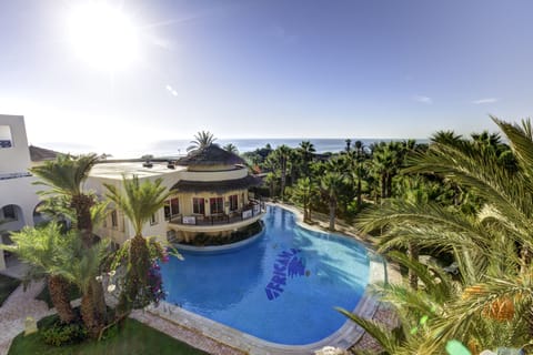 Indoor pool, seasonal outdoor pool, pool umbrellas, sun loungers