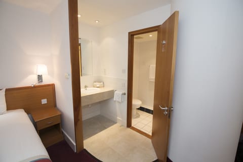 Shower, eco-friendly toiletries, hair dryer, towels