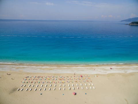 On the beach, white sand, beach towels