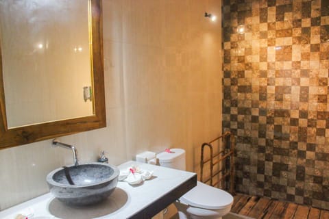 Family Suite, 1 Bedroom, Balcony, Garden View | Bathroom | Shower, rainfall showerhead, free toiletries, hair dryer
