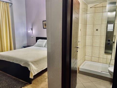 Economy Triple Room, 1 Double Bed with Sofa bed, Balcony, Ground Floor | Pillowtop beds, individually decorated, blackout drapes, free WiFi