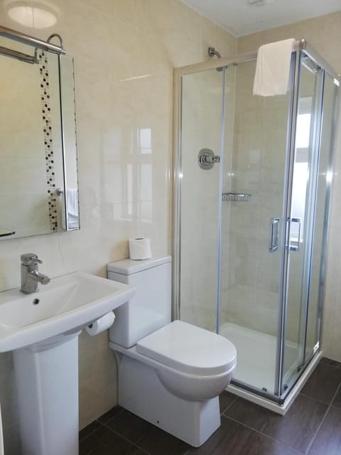 Shower, free toiletries, hair dryer, towels