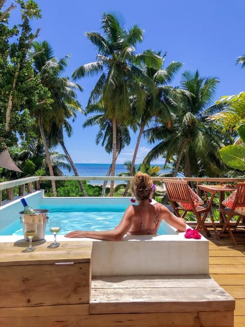 Deluxe Double Room, 1 Bedroom, Ocean View, Beachfront | Minibar, in-room safe, WiFi (free), bed sheets