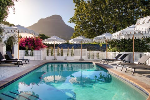 Outdoor pool, pool umbrellas, sun loungers