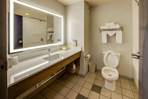 Designer toiletries, hair dryer, towels, soap