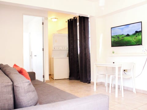 Apartment, 1 Queen Bed with Sofa bed | Living area | Flat-screen TV