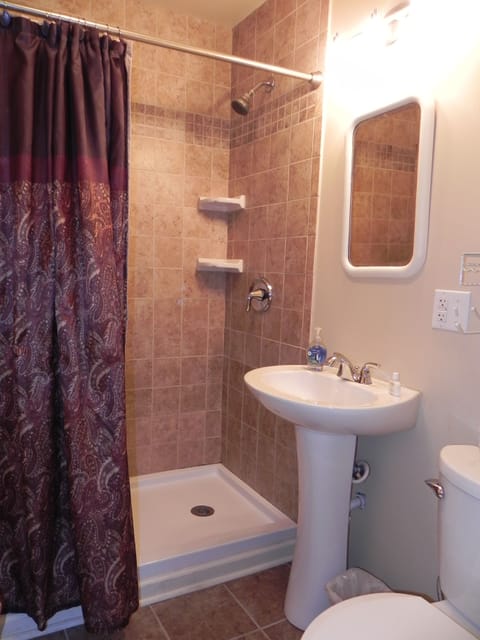 Crossvine Suite | Bathroom | Designer toiletries, hair dryer, bathrobes, towels