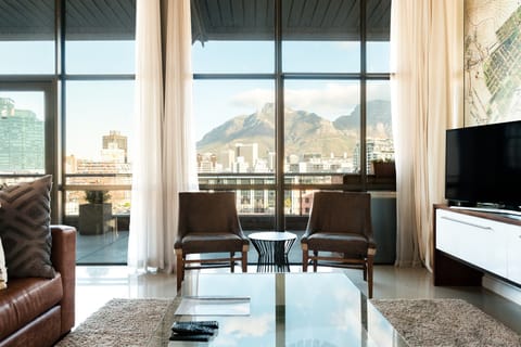Luxury Penthouse, 3 Bedrooms, Non Smoking | Living area | Flat-screen TV
