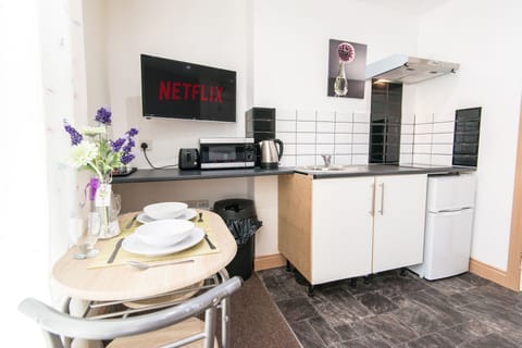 Studio, 1 Double Bed | Private kitchen | Full-size fridge, microwave, oven, electric kettle