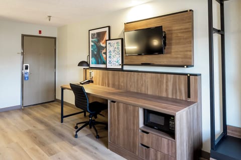 Desk, blackout drapes, iron/ironing board, free cribs/infant beds