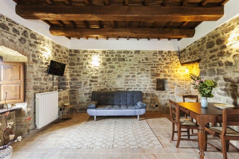 Deluxe Apartment, 2 Bedrooms | Living room | Flat-screen TV