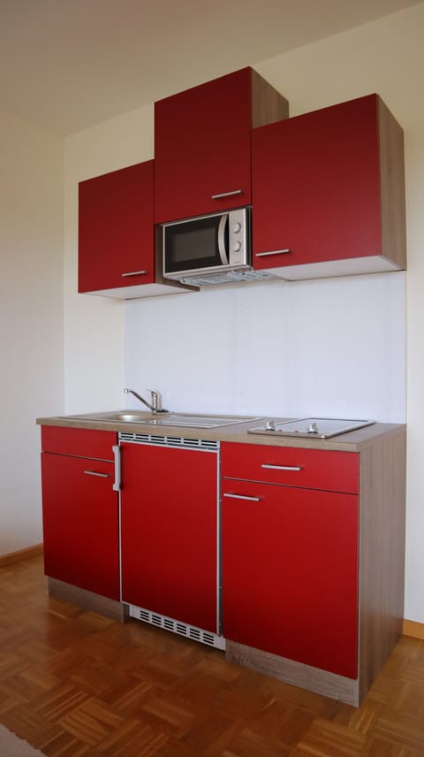 Comfort Room, 1 King Bed, Non Smoking, Balcony | Private kitchen