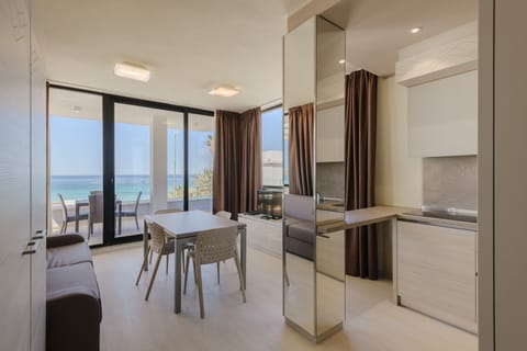 Superior Apartment, 1 Bedroom, Terrace, Sea View | In-room safe, blackout drapes, soundproofing, iron/ironing board