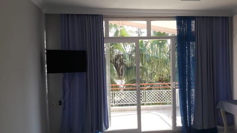Basic Triple Room, Private Bathroom | Television