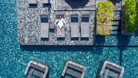 Outdoor pool, open 7:00 AM to 9:00 PM, pool umbrellas, sun loungers