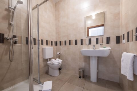 Shower, free toiletries, hair dryer, towels