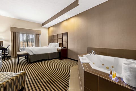 Room, 1 King Bed, Jetted Tub | Premium bedding, down comforters, pillowtop beds, desk