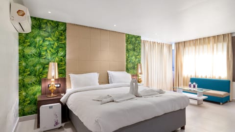 Premium Room with Balcony, 1 Bedroom, City View | 1 bedroom, premium bedding, minibar, in-room safe