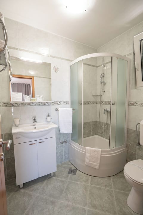 Standard Double Room, Balcony | Bathroom | Shower, free toiletries, hair dryer, slippers